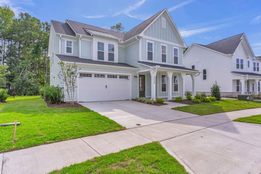 Representative exterior photo of a completed home built from the The Hampton by RobuckHomes in Stonehenge, Raleigh, NC (Image 41).