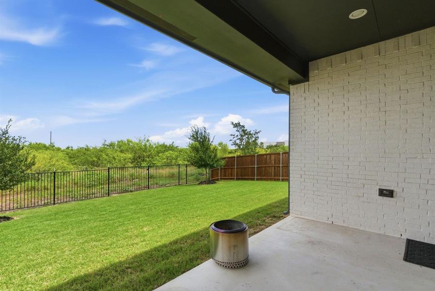 Exterior details and patio area of a home in Sweetgrass, Haslet (Image 23).