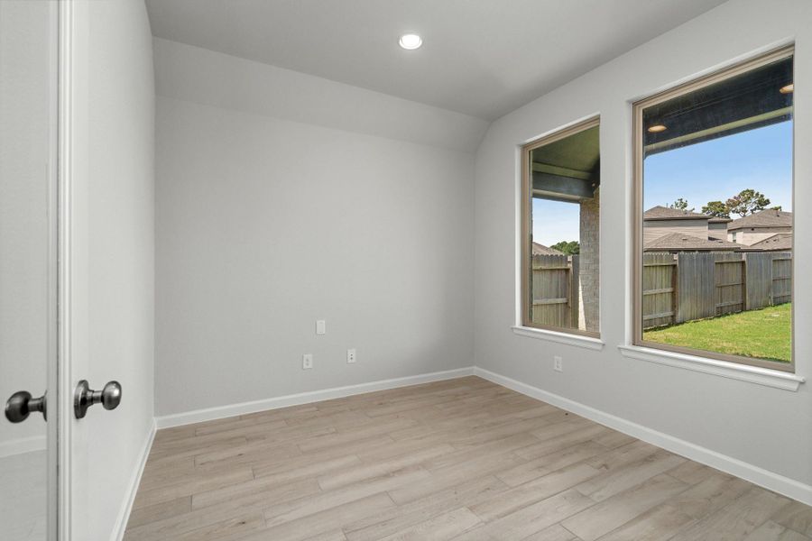 Versatile home office or flex room with natural light.