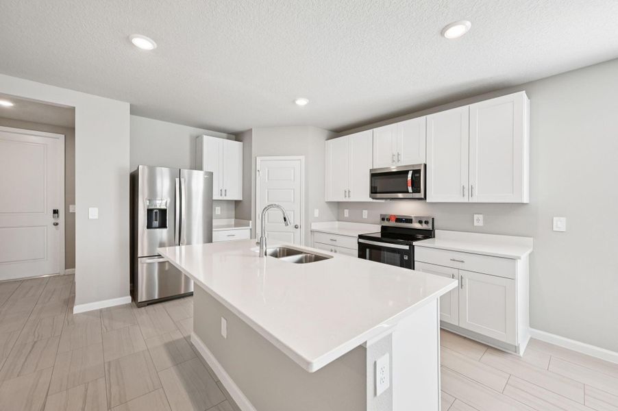 Furnished interior view inside a new home in Hampton Park - Classic Series, Vero Beach (Image 11). Furnished interior view inside a new home in Hampton Park - Classic Series, Vero Beach (Image 11).