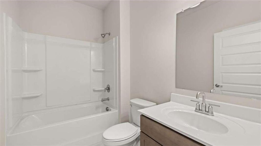 Furnished interior view inside a new home in Oak Ridge Meadows - Active Adult, Locust Grove (Image 13).