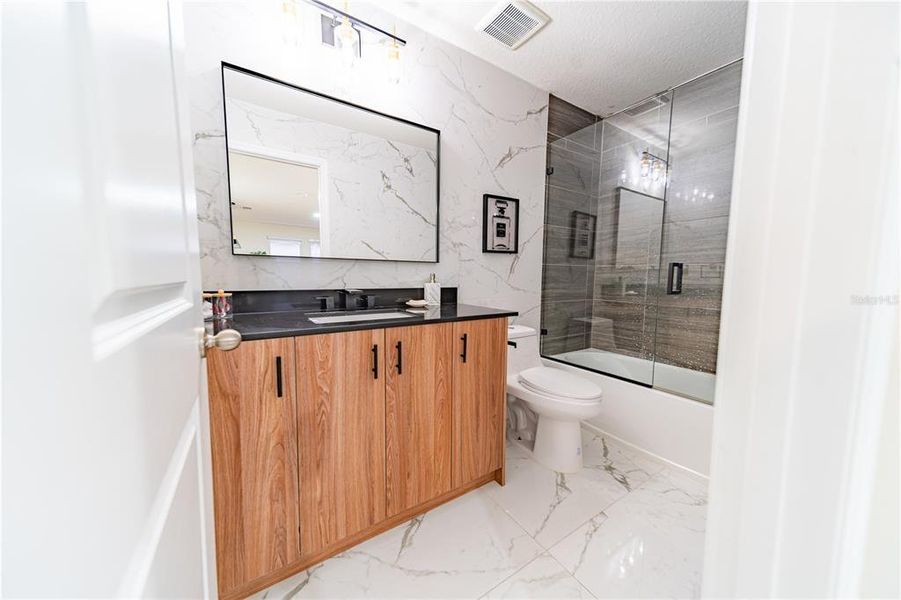 Furnished interior view inside a new home in , Kissimmee (Image 20).