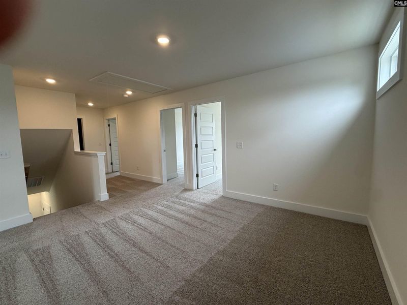Spacious, unfurnished interior of a new home in Cottages at Roofs Pond, West Columbia (Image 36).