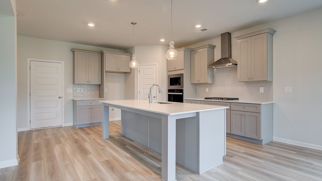 Furnished interior view inside a new home in Westwind Estates, Hampton (Image 14).