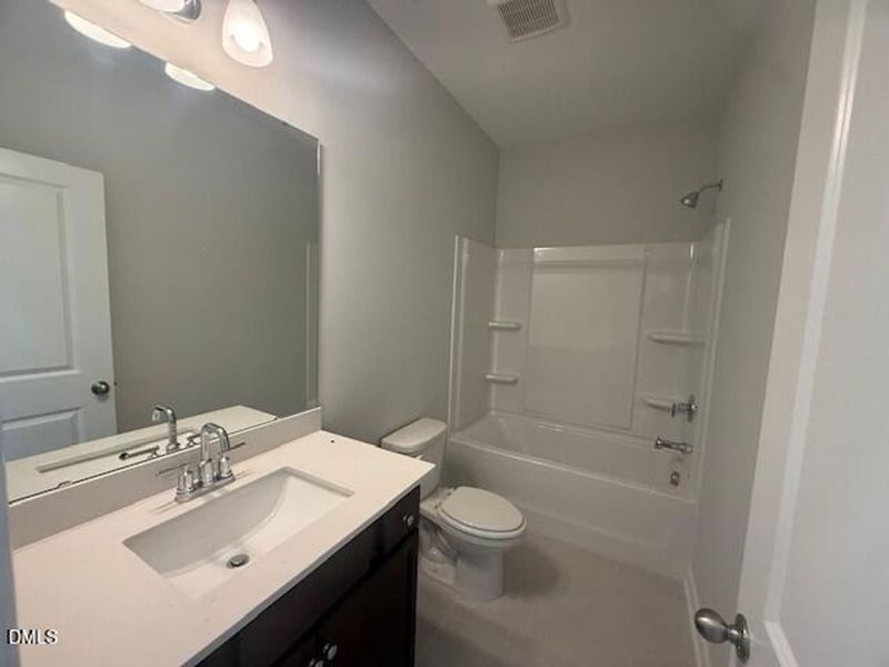 Furnished interior view inside a new home in Woodland Crossing, Zebulon (Image 9).