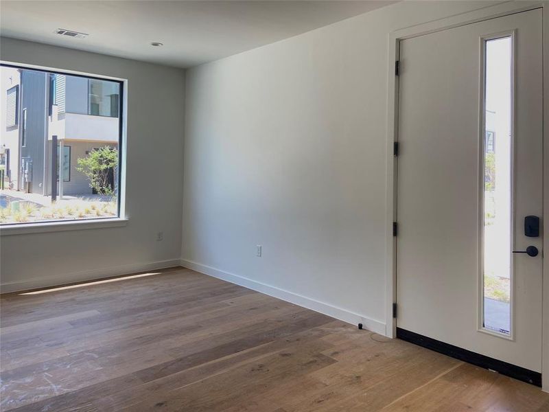 Entry level has an oversized 2 car garage, elevator, and large secondary living room. (construction photos - professional photos upon completion) Entry level has an oversized 2 car garage, elevator, and large secondary living room. (construction photos - professional photos upon completion)