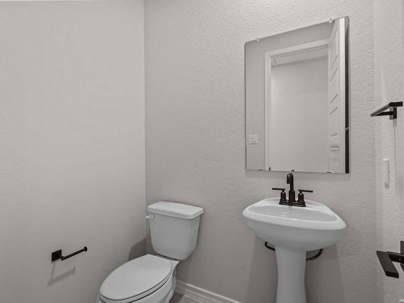 Furnished interior view inside a new home in Potranco Oaks, Castroville (Image 18).
