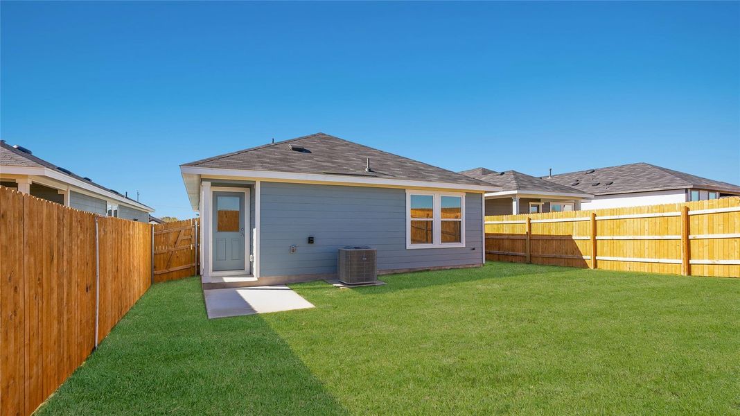 Exterior details and patio area of a home in Marigold, Kyle (Image 3).