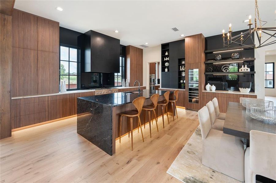 Modern Style Kitchen with Rich Tones and Under Cabinet Lighting