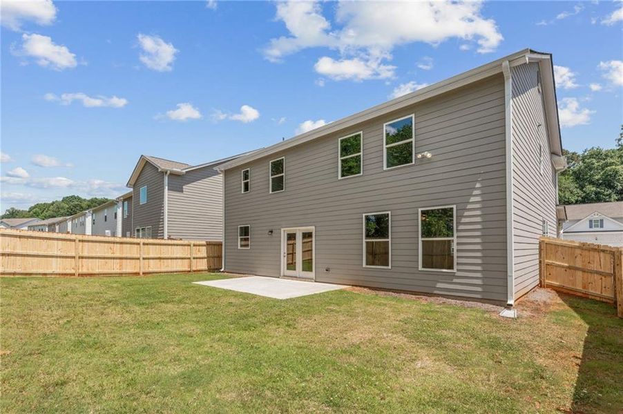 Exterior details and patio area of a home in Clark Farms, Flowery Branch (Image 3).