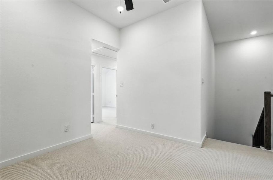 Unfurnished bedroom featuring attic access, carpet, recessed lighting, and ceiling fan Unfurnished bedroom featuring attic access, carpet, recessed lighting, and ceiling fan