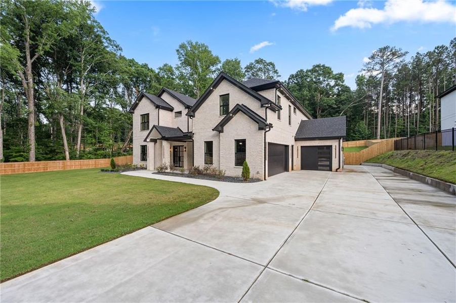 Front exterior of a new home in , Grayson, GA, highlighting curb appeal (Image 1). Front exterior of a new home in , Grayson, GA, highlighting curb appeal (Image 1).