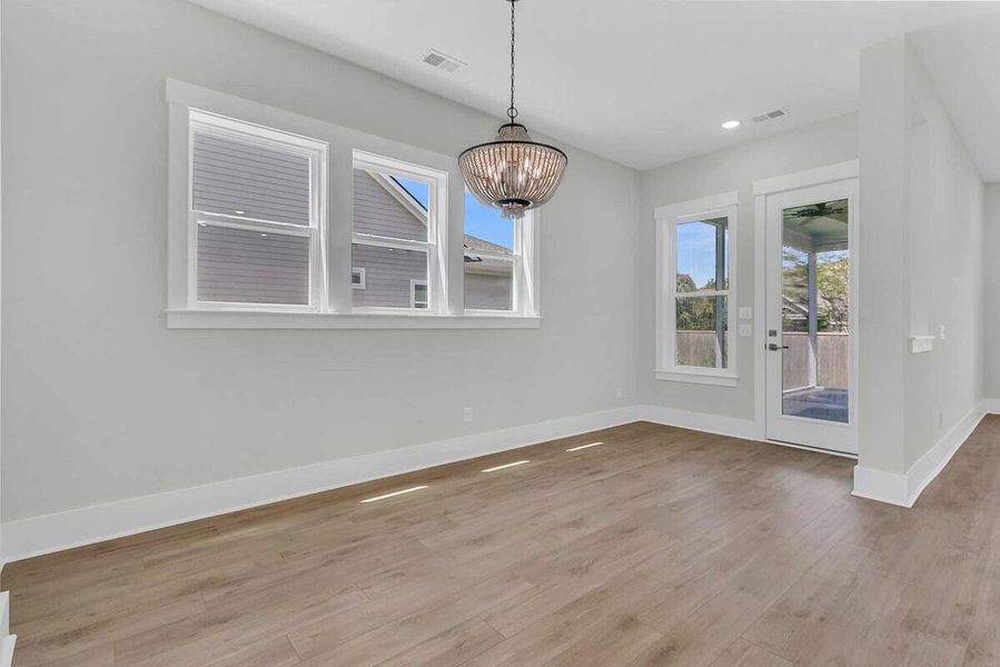 Spacious, unfurnished interior of a new home in Hidden Ponds Reserve, Awendaw (Image 14).