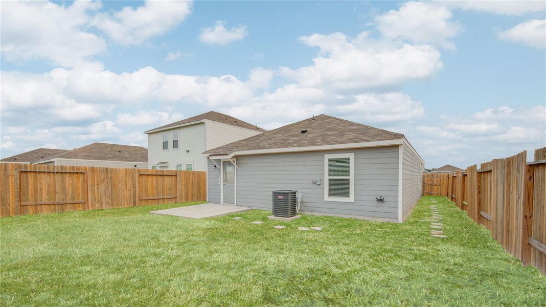 Exterior details and patio area of a home in Wayside Village, Houston (Image 3).
