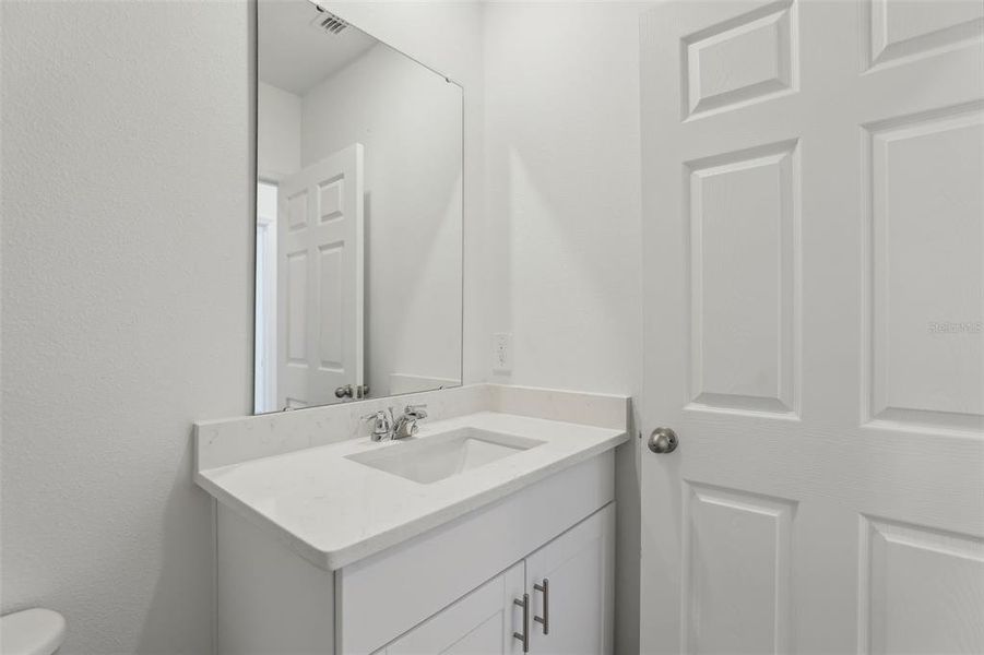 Furnished interior view inside a new home in Lawson Dunes - Signature Series, Haines City (Image 10).