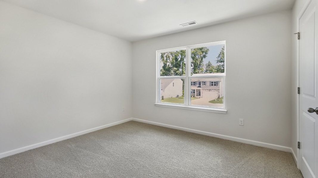 Spacious, unfurnished interior of a new home in Ridgewood Farms, Winterville (Image 25). Spacious, unfurnished interior of a new home in Ridgewood Farms, Winterville (Image 25).