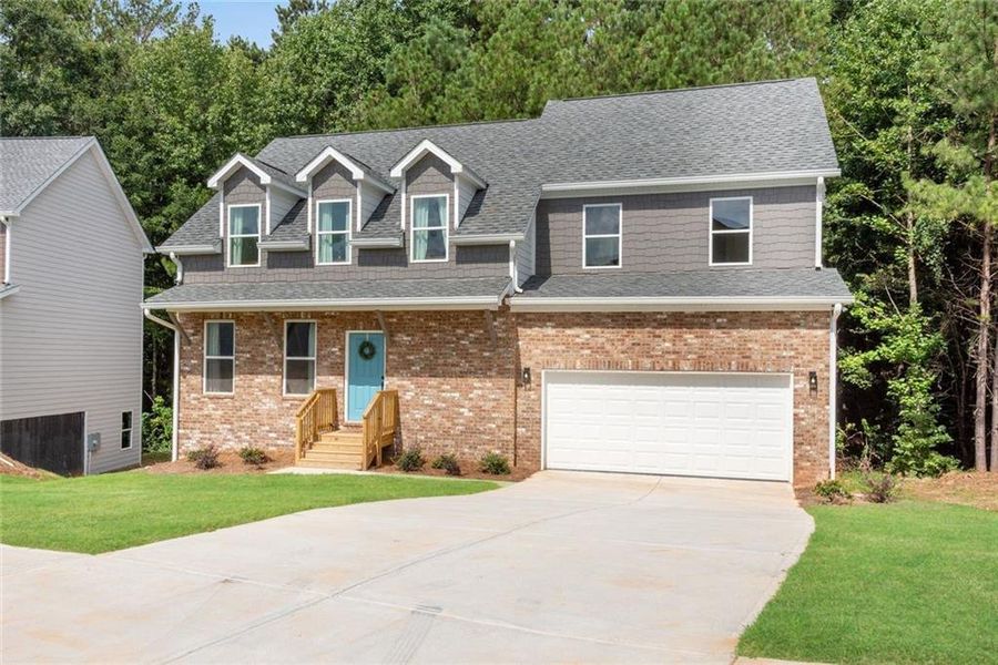Front exterior of a new home in , Ellenwood, GA, highlighting curb appeal (Image 2). Front exterior of a new home in , Ellenwood, GA, highlighting curb appeal (Image 2).