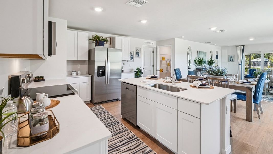 Furnished interior view inside a new home in Coral Bay - Express & Tradition, North Fort Myers (Image 12).