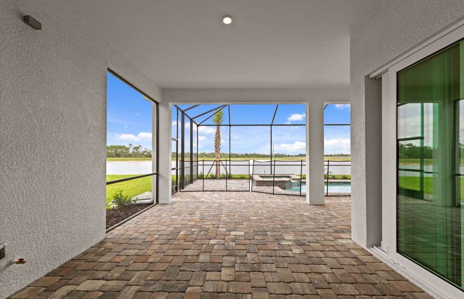 Exterior details and patio area of a home in Del Webb Oak Creek, North Fort Myers (Image 26).