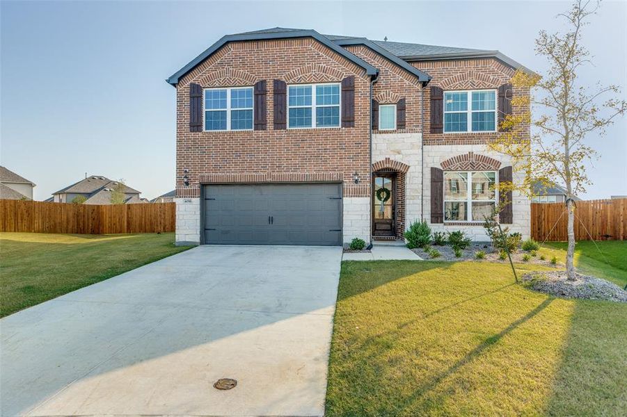 Front exterior of a new home in , McKinney, TX, highlighting curb appeal (Image 1).