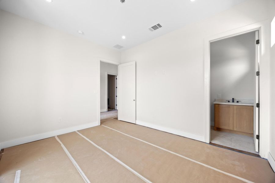 Room featuring recessed lighting and light-toned walls