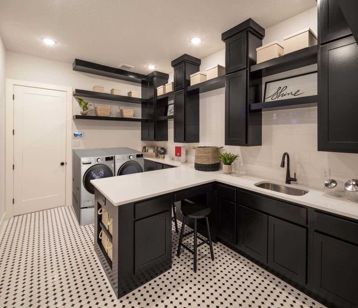 Representative furnished interior of a home built from the 216G by Highland Homes in Quail Hollow, Rockwall (Image 45).