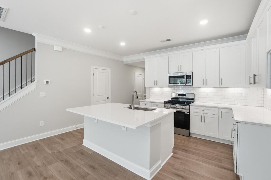 Furnished interior view inside a new home in Harrisburg Village Townhomes, Harrisburg (Image 11).
