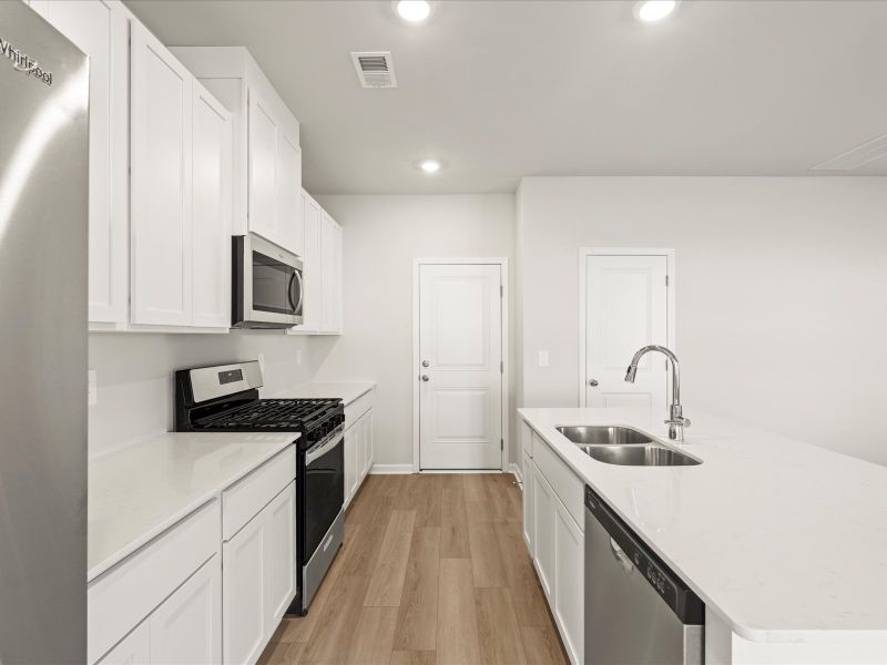 Furnished interior view inside a new home in Brayfield Manor - Heritage Collection, Wellford (Image 5).