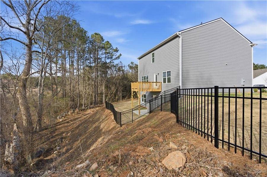 Exterior details and patio area of a home in The Reserve at Chapel Hill Phase II, Douglasville (Image 15).