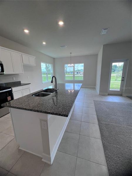 Furnished interior view inside a new home in Harmony Central, Harmony (Image 3).