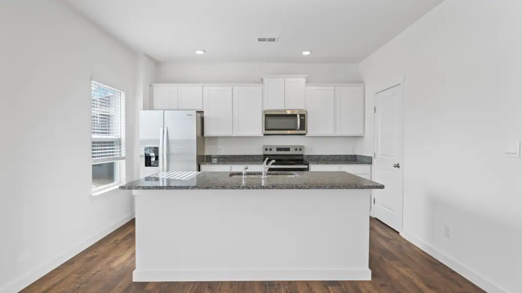Furnished interior view inside a new home in Lone Oaks Farm, Cleveland (Image 5).