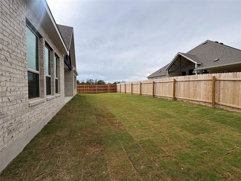 Exterior details and patio area of a home in Retreat at San Gabriel, Georgetown (Image 3).