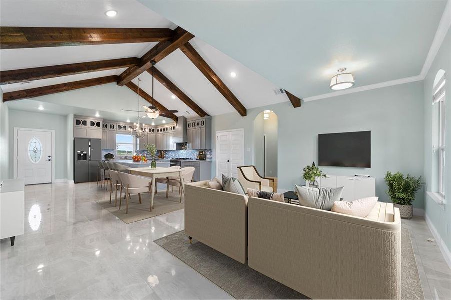 Tiled living room with high vaulted ceiling and beamed ceiling