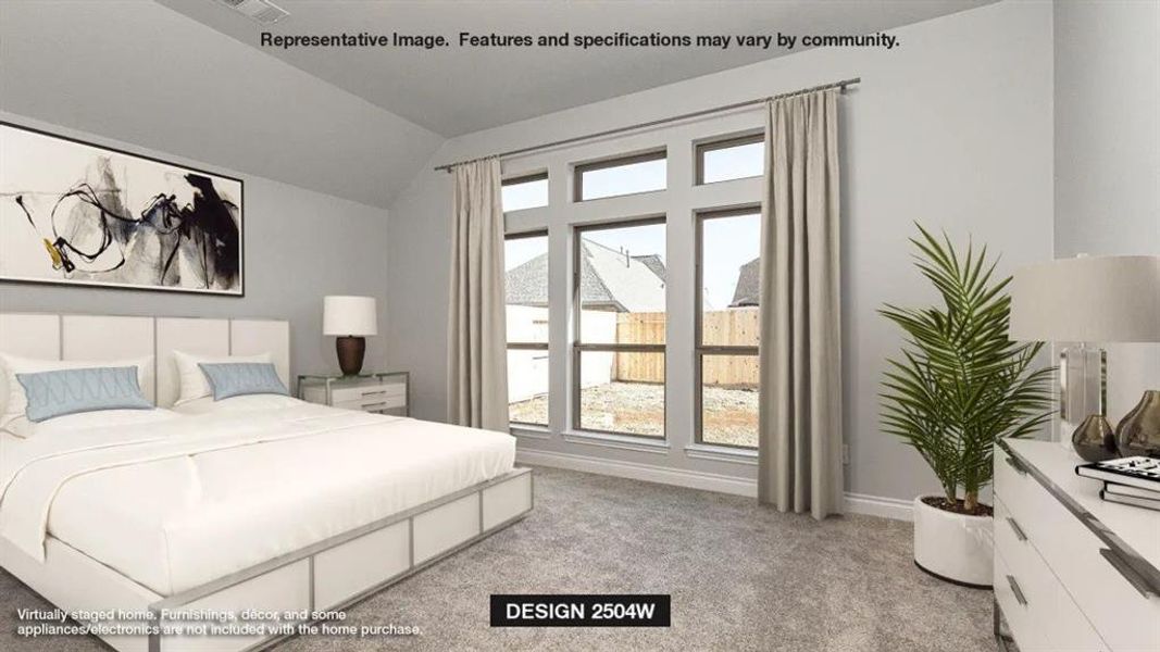 Carpeted bedroom featuring lofted ceiling