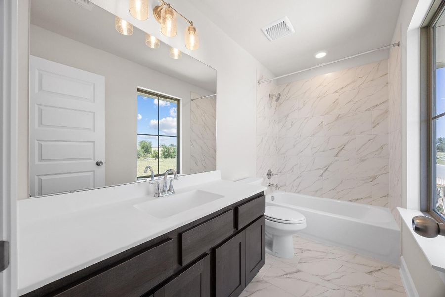 Furnished interior view inside a new home in Parmer Ranch, Georgetown (Image 16). Furnished interior view inside a new home in Parmer Ranch, Georgetown (Image 16).