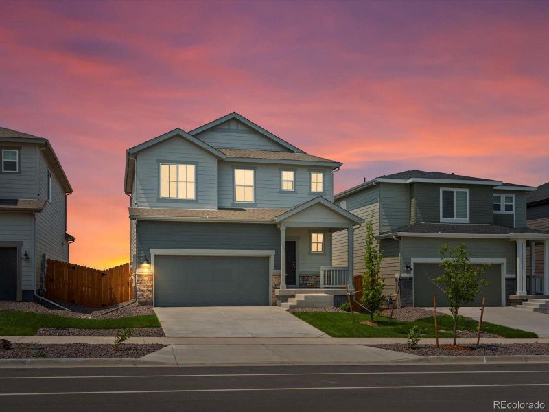 Front exterior of a new home in Lake Bluff, Greeley, CO, highlighting curb appeal (Image 2). Front exterior of a new home in Lake Bluff, Greeley, CO, highlighting curb appeal (Image 2).