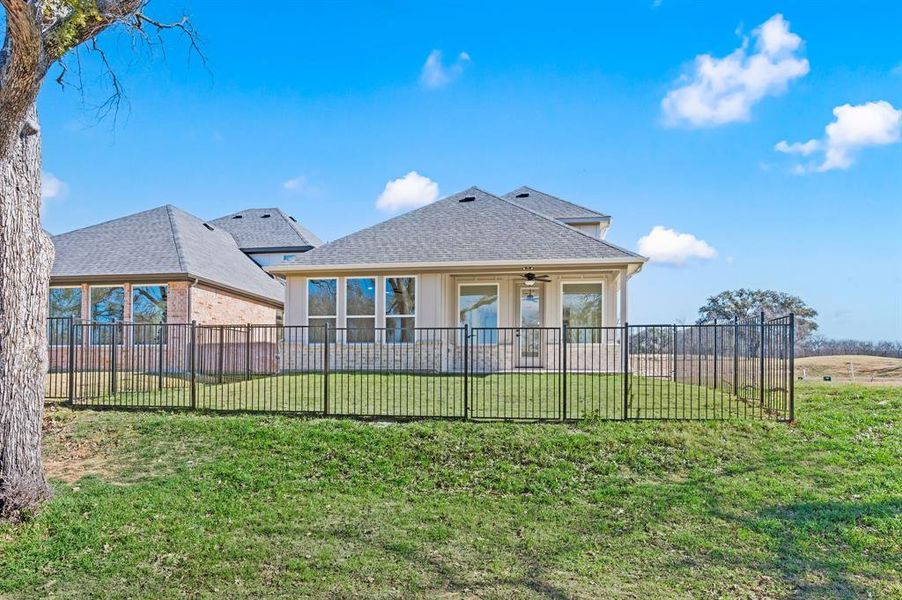 Exterior details and patio area of a home in The Resort on Eagle Mt. Lake, Fort Worth (Image 23).
