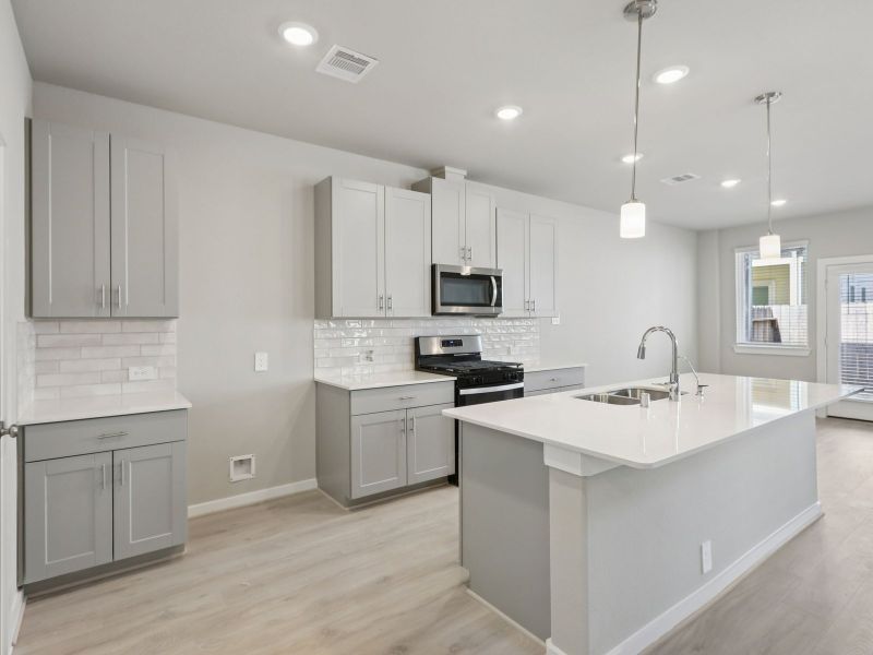 Furnished interior view inside a new home in Kemah Crossing - City Series, Kemah (Image 4).