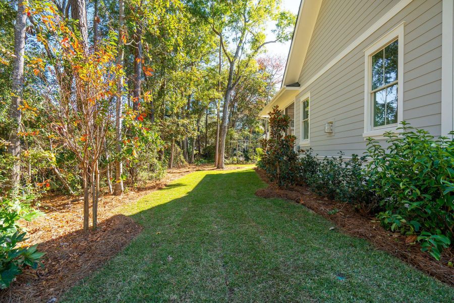 Exterior details and patio area of a home in , Johns Island (Image 36).