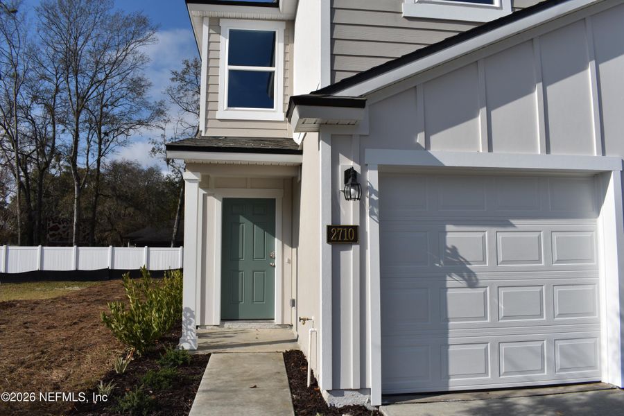 Exterior details and patio area of a home in Irongate Villas, Jacksonville (Image 2).