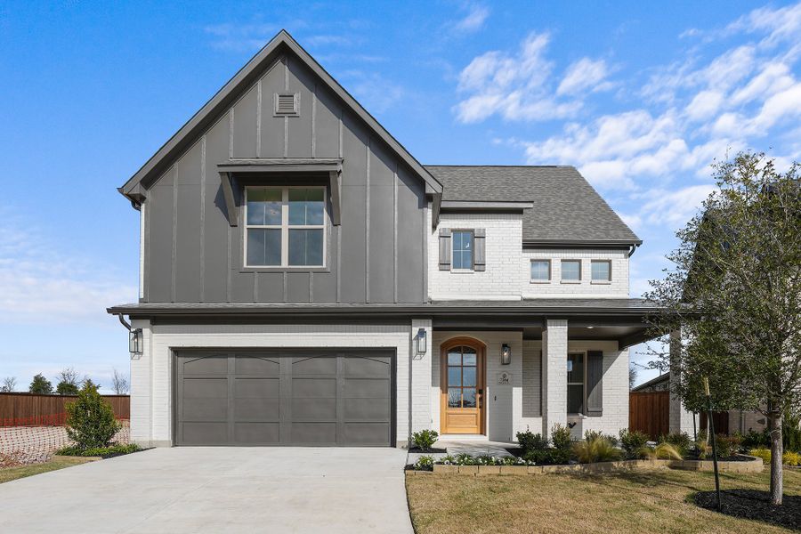 Front exterior of a new home in Aster Park, McKinney, TX, highlighting curb appeal (Image 23). Front exterior of a new home in Aster Park, McKinney, TX, highlighting curb appeal (Image 23).