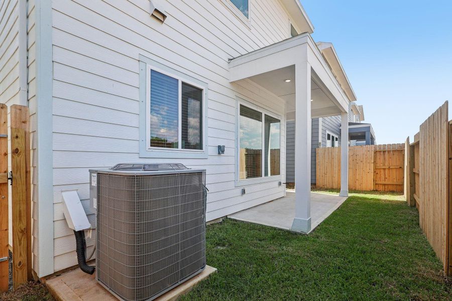 Exterior details and patio area of a home in Kemah Crossing - Luxe Series, Kemah (Image 4).