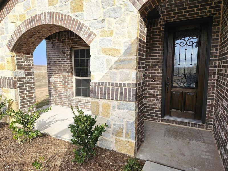 Exterior details and patio area of a home in Corner Stone Ranch, Howe (Image 3).