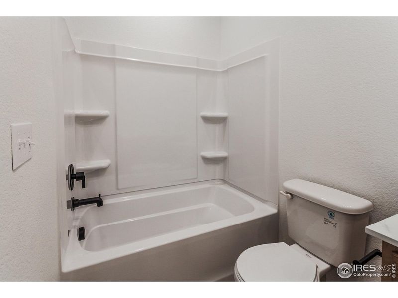 Furnished interior view inside a new home in Bloom Trailblazer Collection - Single Family Homes, Fort Collins (Image 5).