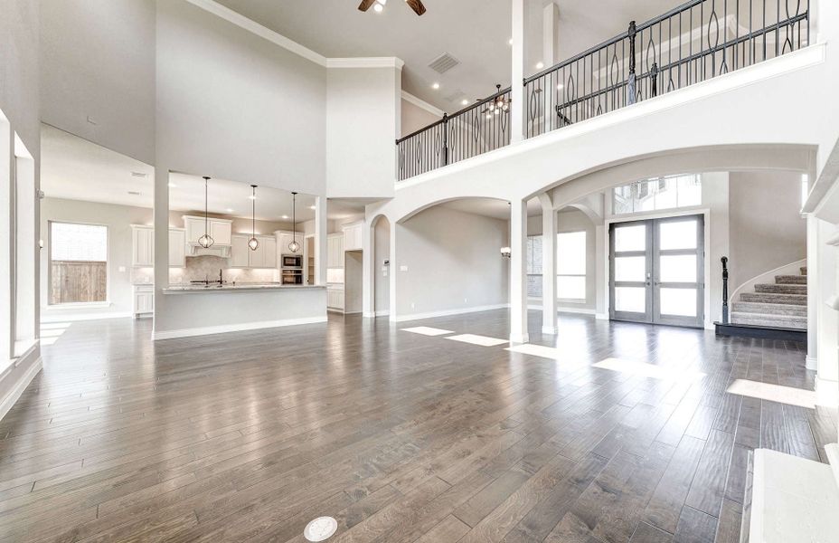 Representative unfurnished interior of a home built from the 4590 by Ravenna Homes in Artavia 70′, Conroe (Image 22).