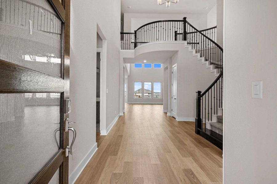 Entry Foyer of Home with Grand Staircase