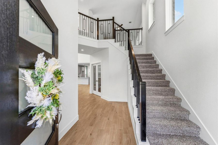You'll immediately noticed the soaring ceilings and natural light