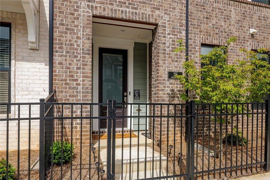 Exterior details and patio area of a home in Ashbury, Roswell (Image 3).