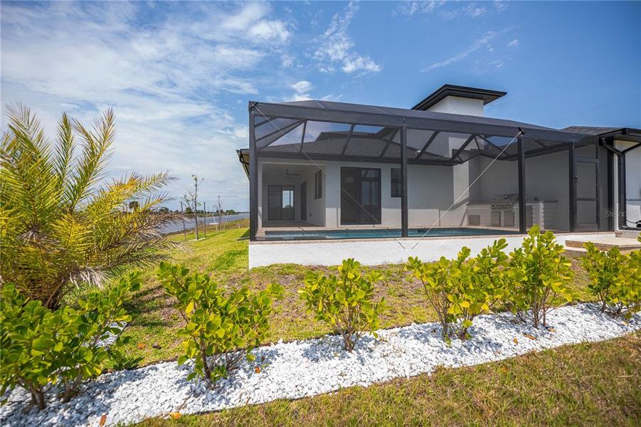 Exterior details and patio area of a home in , Placida (Image 39).