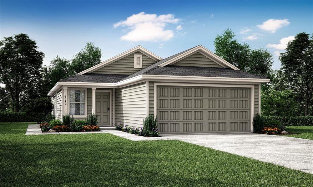 View of front of home featuring a front lawn and a garage